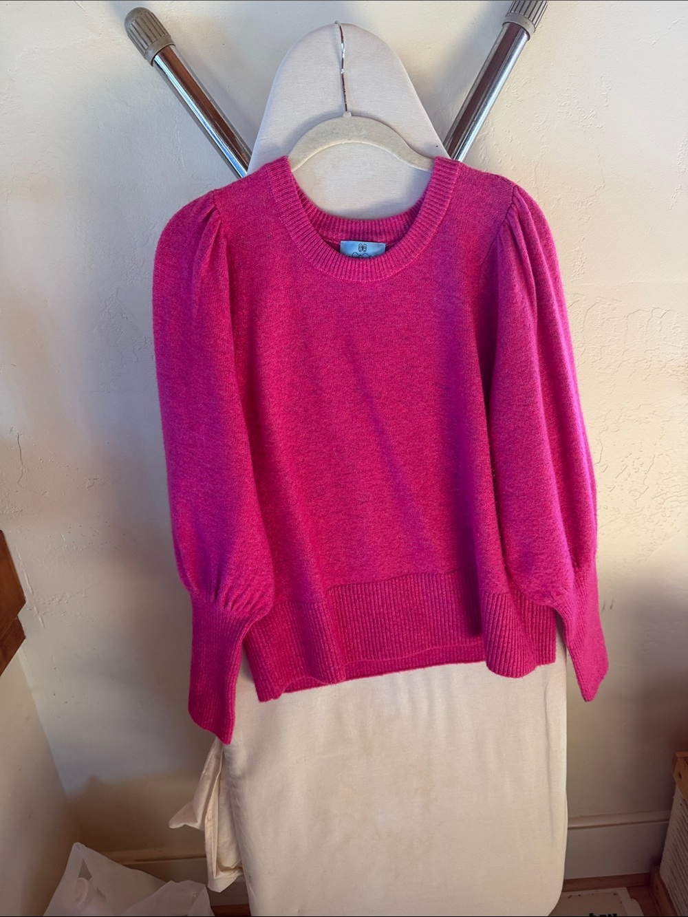 Hot pink sweater with puffy sleeves